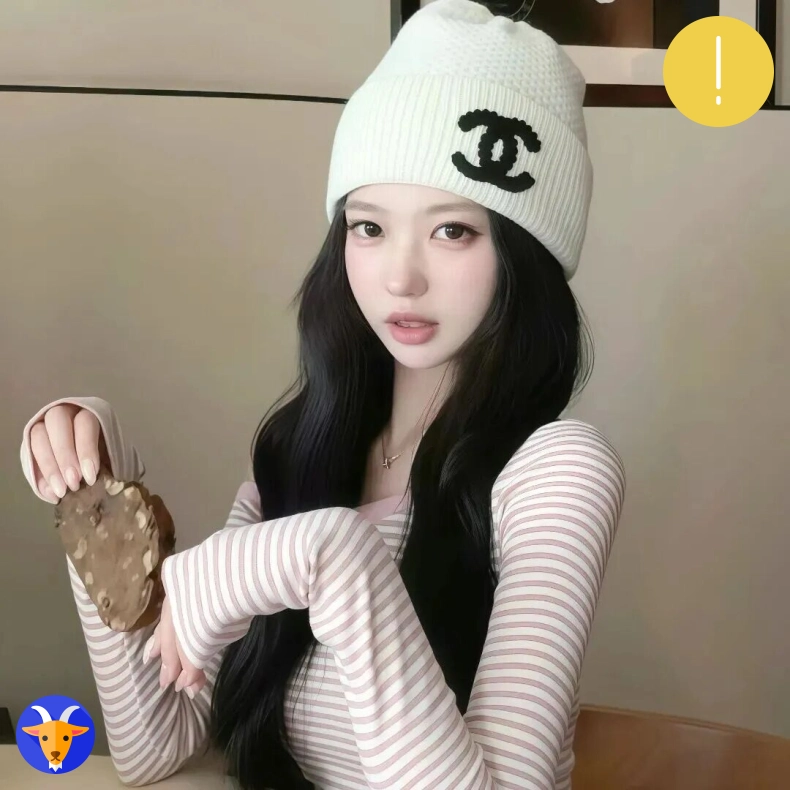梁女士